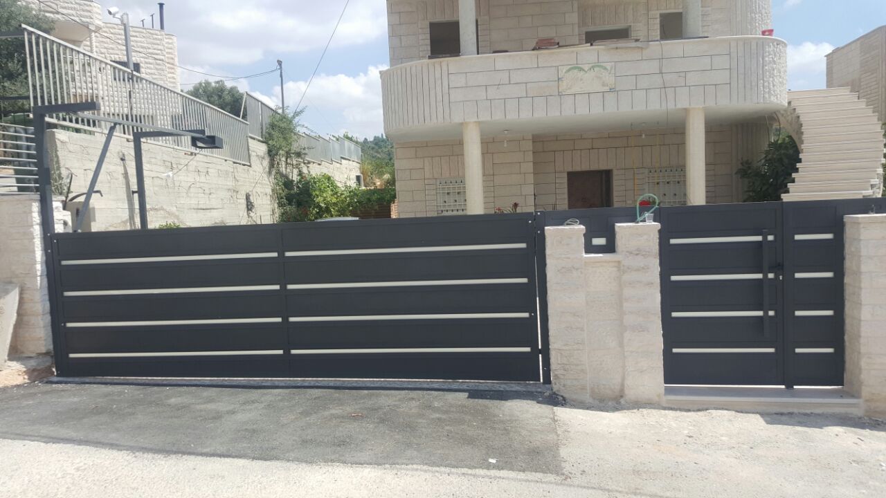 שערים להולכי רגל ער מתרומם לרכב אטום משולב פס זכוכית דק